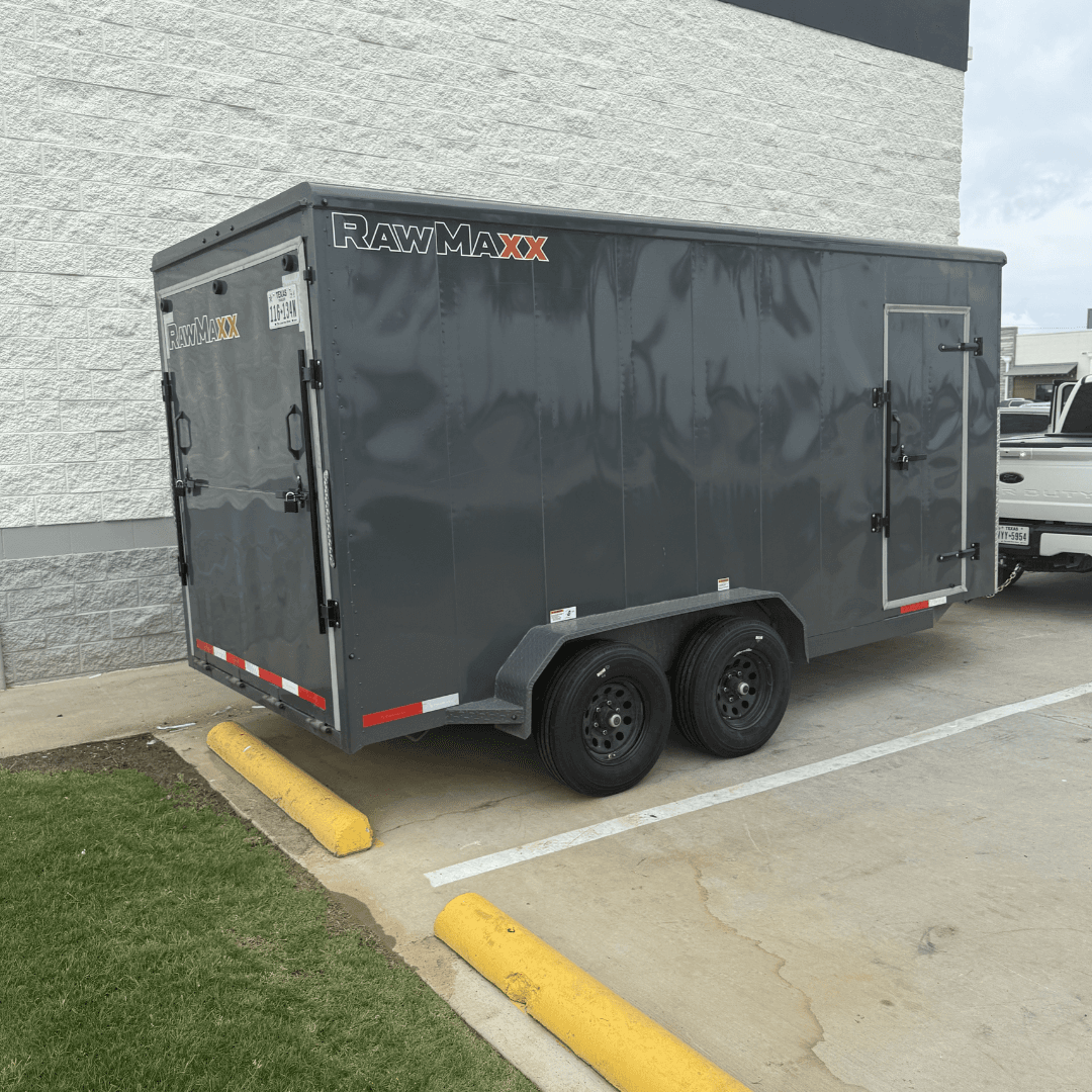16ft RawMaxx enclosed cargo trailer rental Haslet TX - dark gray enclosed trailer exterior side view